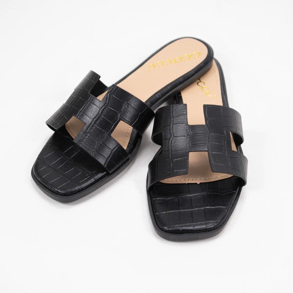 Black Cutout Slide Sandal with H-Shaped Croc Pattern