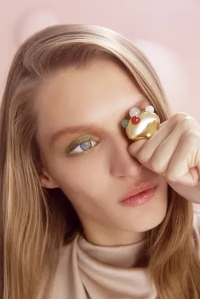 Gold ring with stones