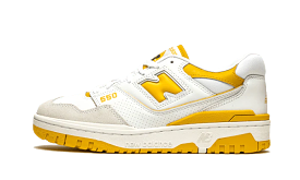 New Balance 550 Sea Salt Varsity Gold sneakers.