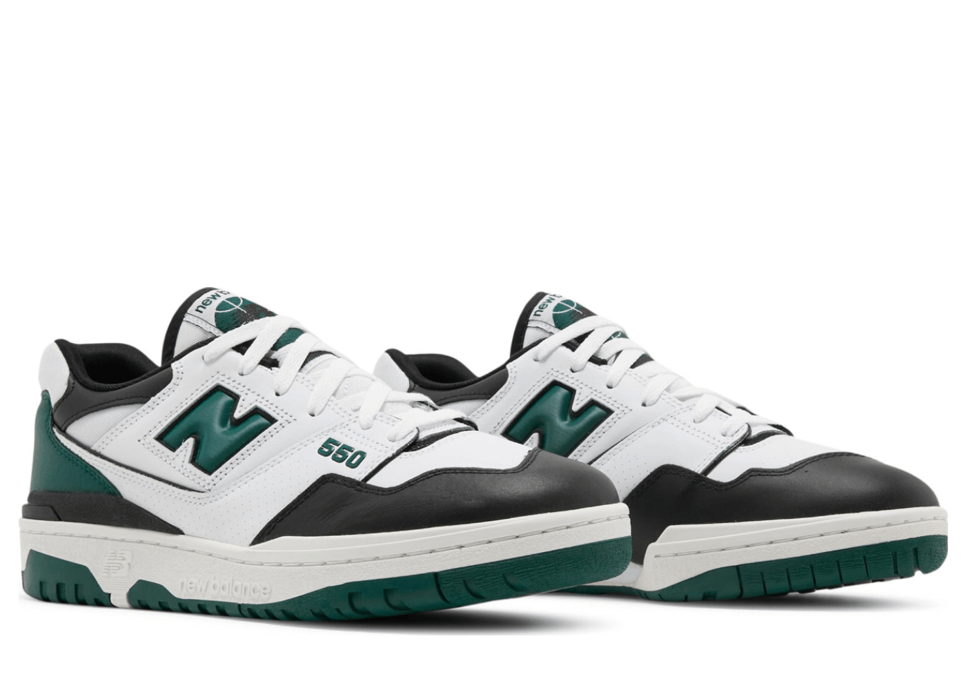 New Balance 550 sneakers in white, green, and black.