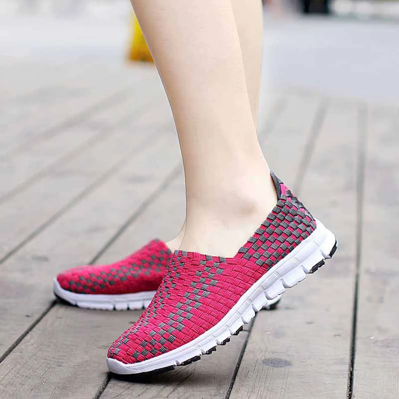 Pink slip on sneaker in checkered weave design