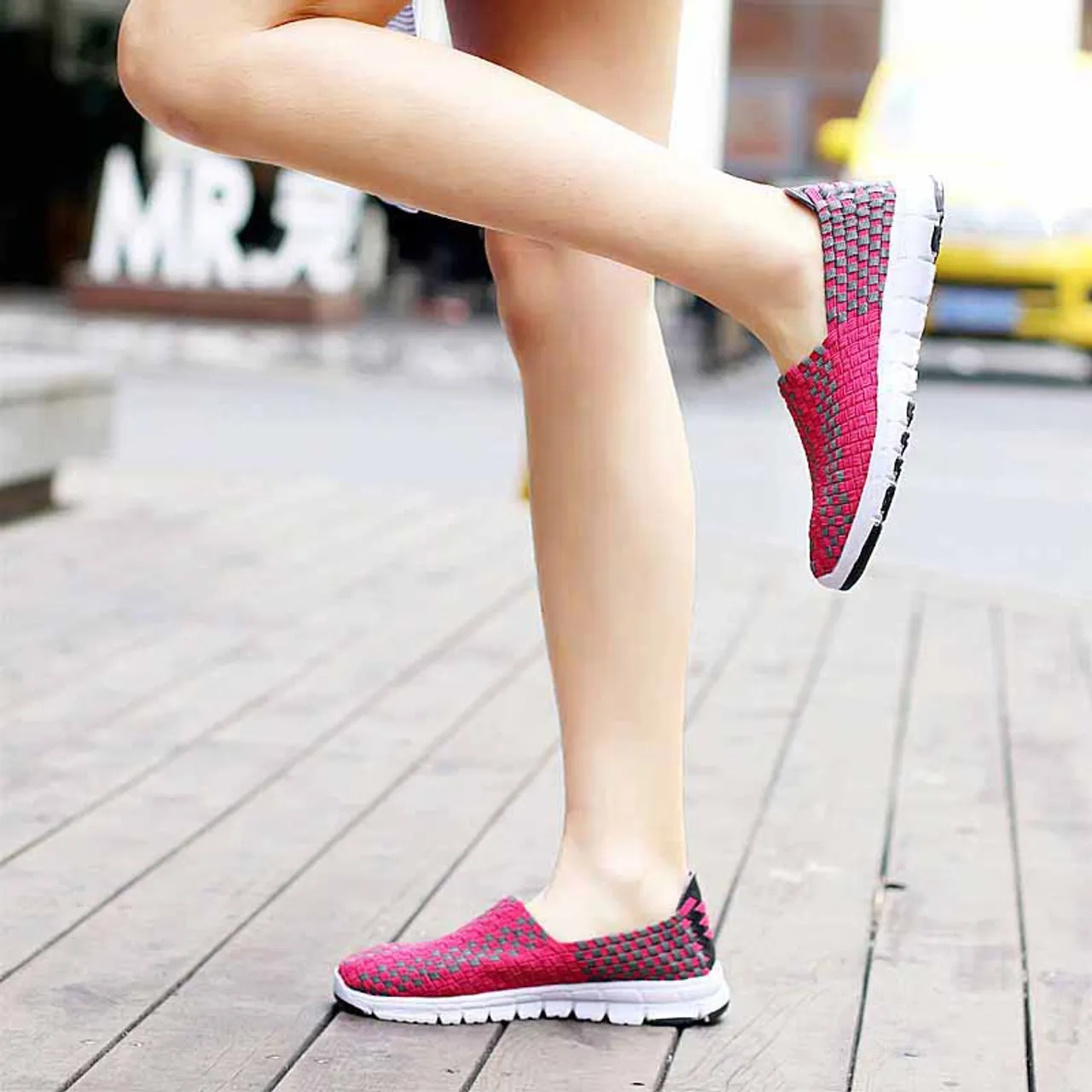 Pink slip on sneaker in checkered weave design