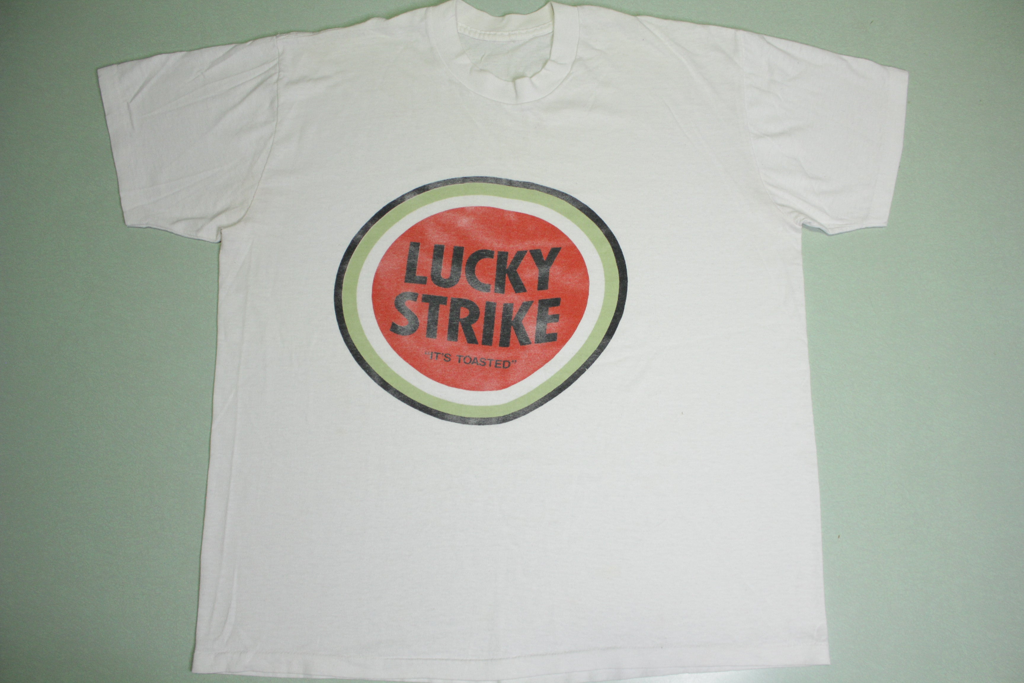 Vintage 80's Lucky Strike It's Toasted Cigarette Smoking T-Shirt Single Stitch