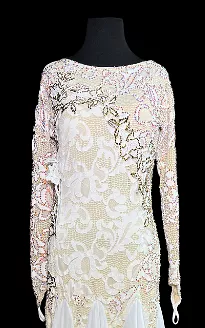 White Ballroom Dress with Floral Lace Appliqué, Nude Underlayer, Stones, and Soft Chiffon Skirt in Size Medium.