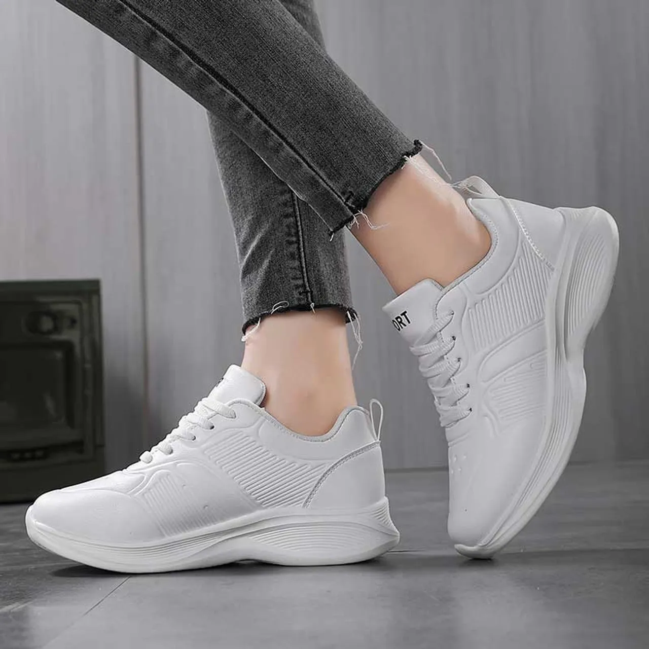 White stripe casual sneaker with accents.