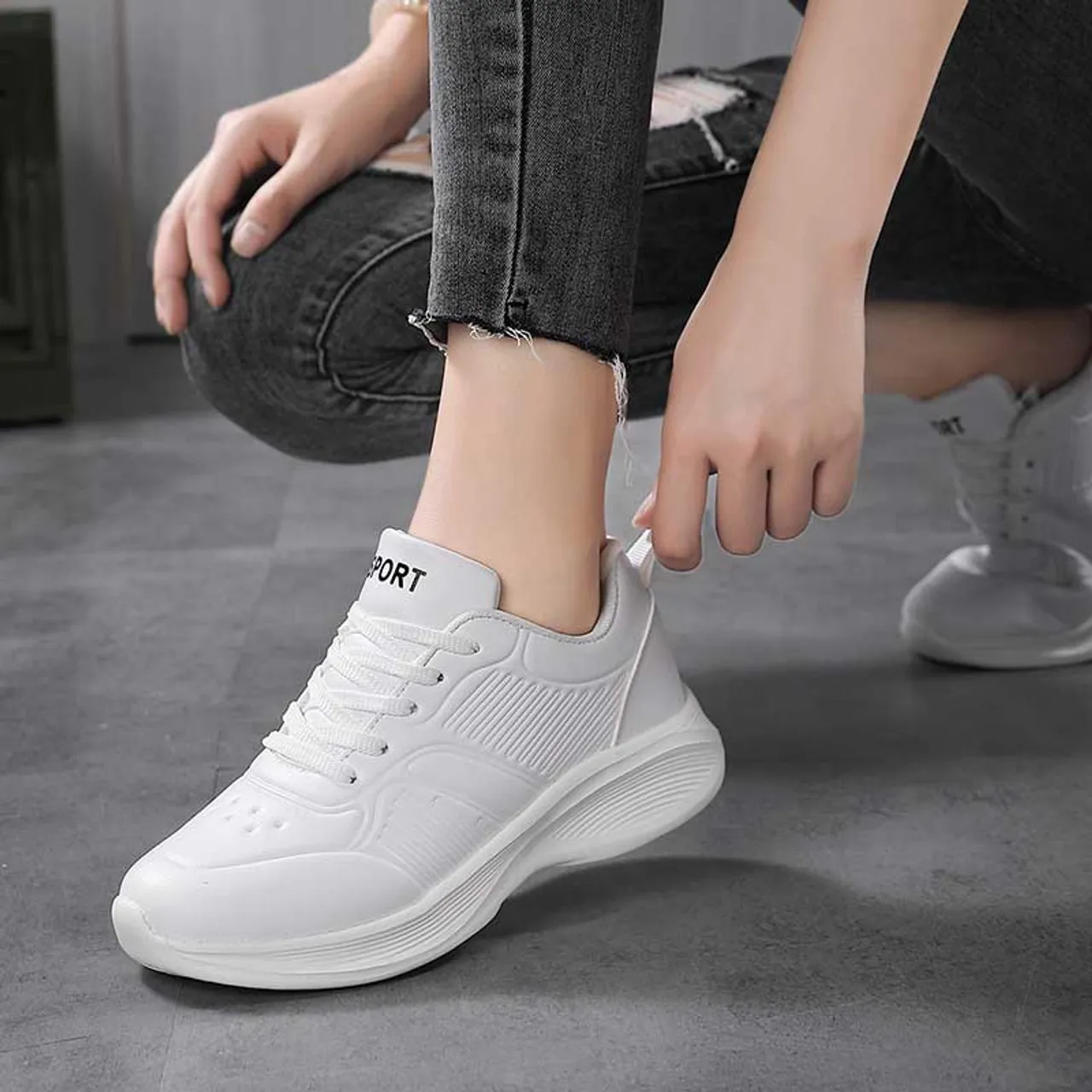 White stripe casual sneaker with accents.