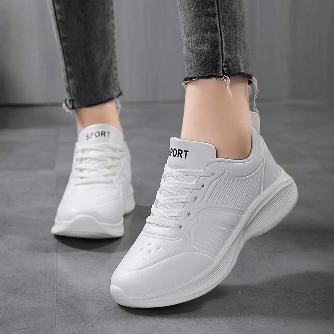 White stripe casual sneaker with accents.